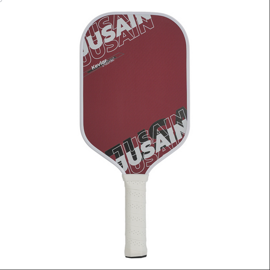 Red professional series with JUSAIN branding; what is the best pickleball paddle for high-intensity durability and style.