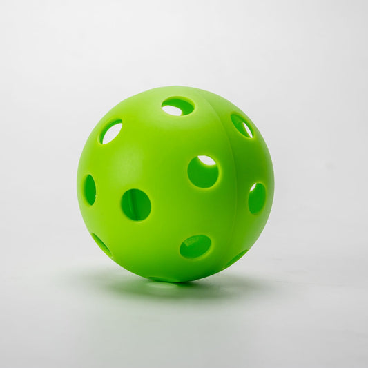 Lime Green TPE 26-hole indoor pickleball. How to hold a pickleball paddle for control.