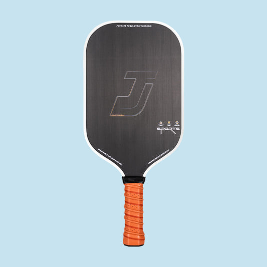 Carbon Fiber Pickleball Paddle Appearance with a black face, white TPU edging strip, and orange breathable anti-slip grip. The paddle face is inscribed with "YOU HAVE TO BELIEVE IN YOURSELF". This is an option for what are good pickleball paddles, showcasing an available color design. If you are asking where can i buy pickleball paddles, this is one such design.