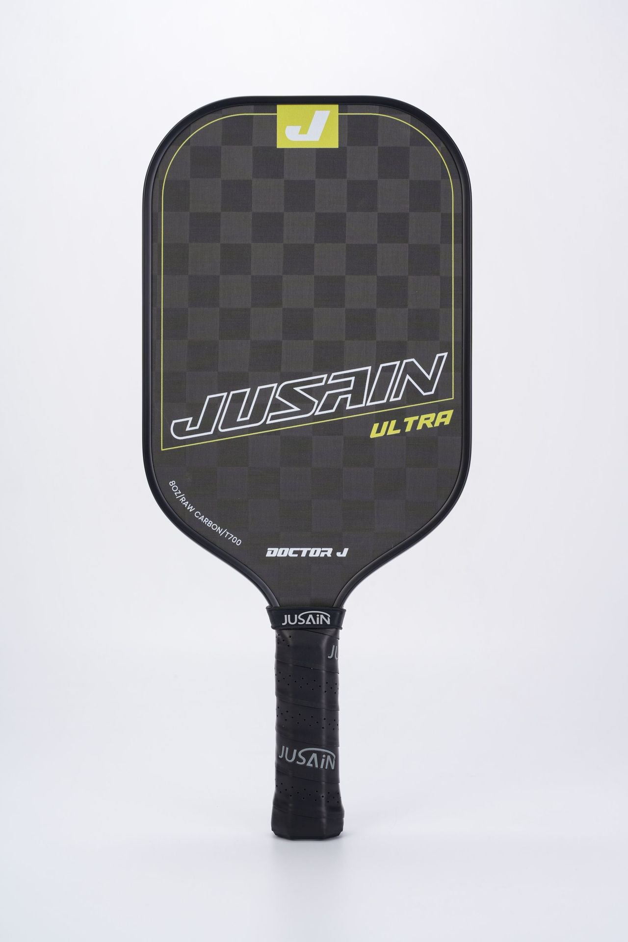Close-up of the black and bright yellow JUSAIN ULTRA pickleball paddle. The paddle face has a checkered texture of 8OZ RAW CARBON/T700 carbon fiber. Suitable for inquiries about what are good pickleball paddles.