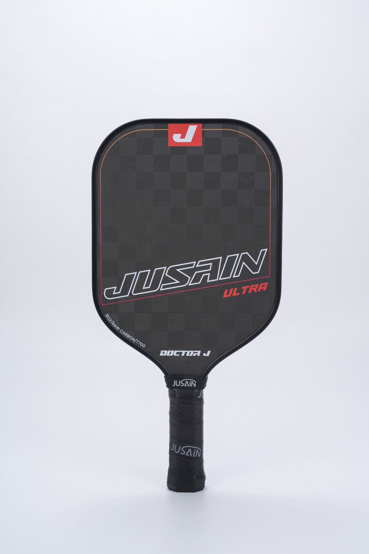 Full front view of the JUSSAIN ULTRA pickleball paddle featuring a black carbon fiber surface with orange-red accent lines and branding. This offers another color choice when looking for where to buy a pickleball paddle, with a professional look and 16mm thickness.