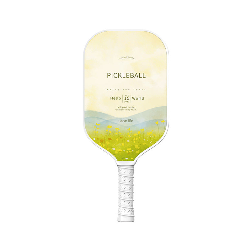 Xephira parent-child/kid themed offensive pickleball paddle, featuring a sunny yellow flower field watercolor design. This 13mm paddle is a stylish option, even when asking what is a good pickleball paddle for beginners.