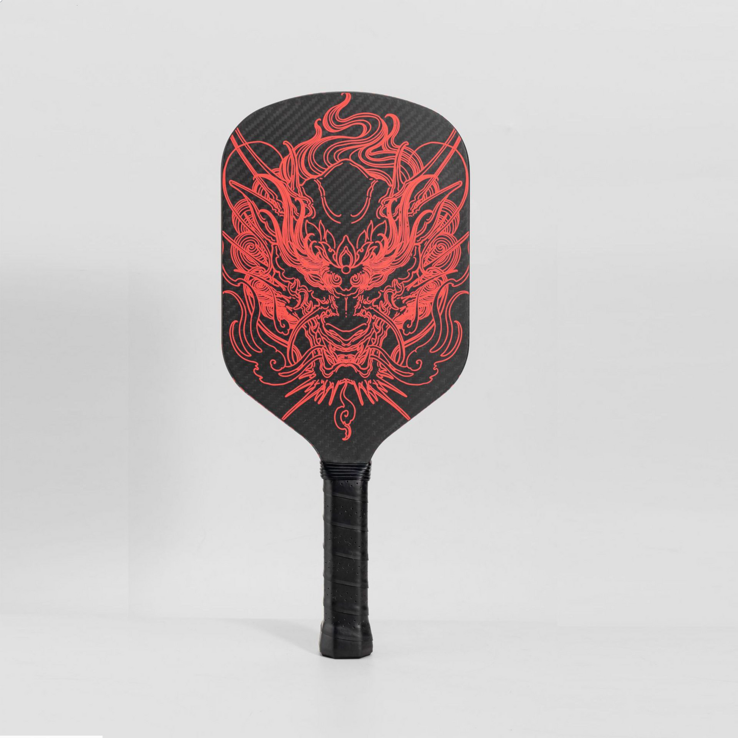 Xephira dragon-themed paddle with a black handle. Perfect for players asking where can I buy pickleball paddles, this unique design offers excellent control, making it a step up for those seeking what is a good pickleball paddle for beginners.