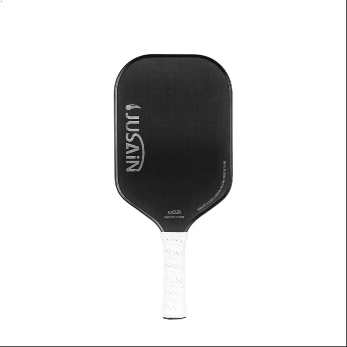 Black JUSAIN carbon fiber paddle weighing 8.3 oz, great for those asking what material is best for pickleball paddles.