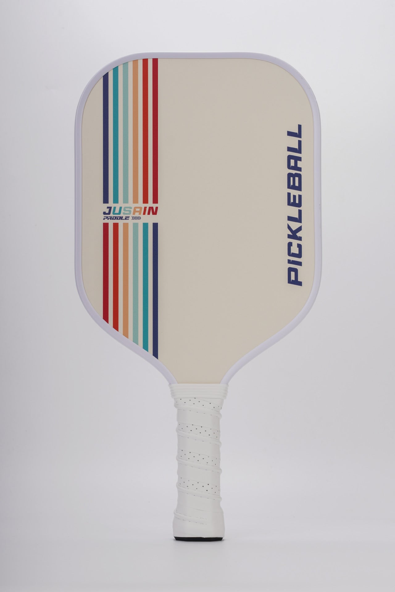 How to hold a pickleball paddle? This retro striped paddle embodies what makes a pickleball paddle good.