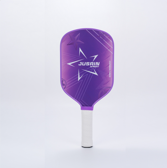 A purple star-patterned paddle showing how to hold a pickleball paddle. As what is a good pickleball paddle for beginners, its carbon fiber surface provides excellent control.
