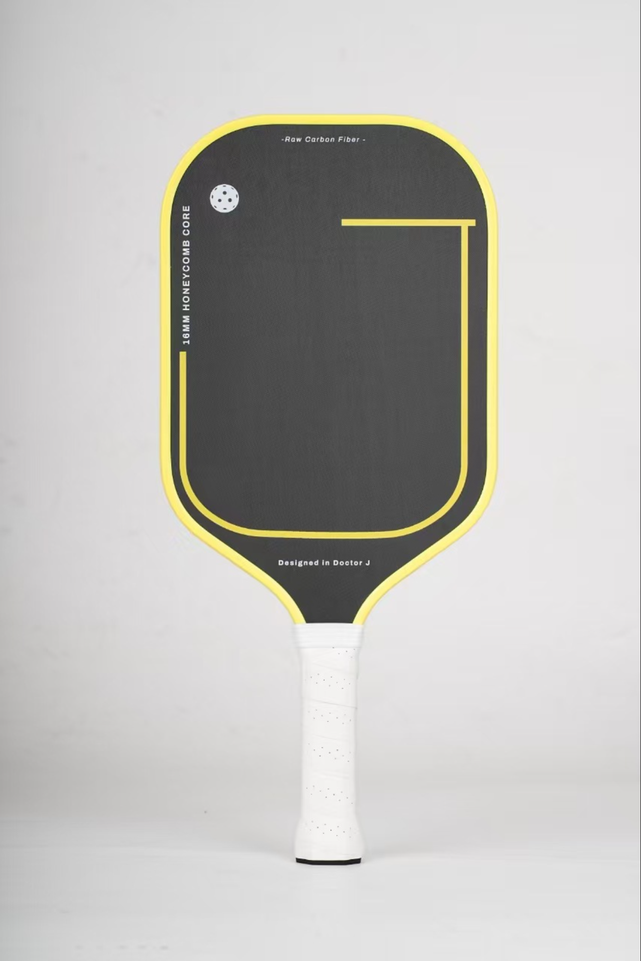 Yellow rimmed Xephira paddle made of carbon fiber, answering which pickleball paddle is best for me.