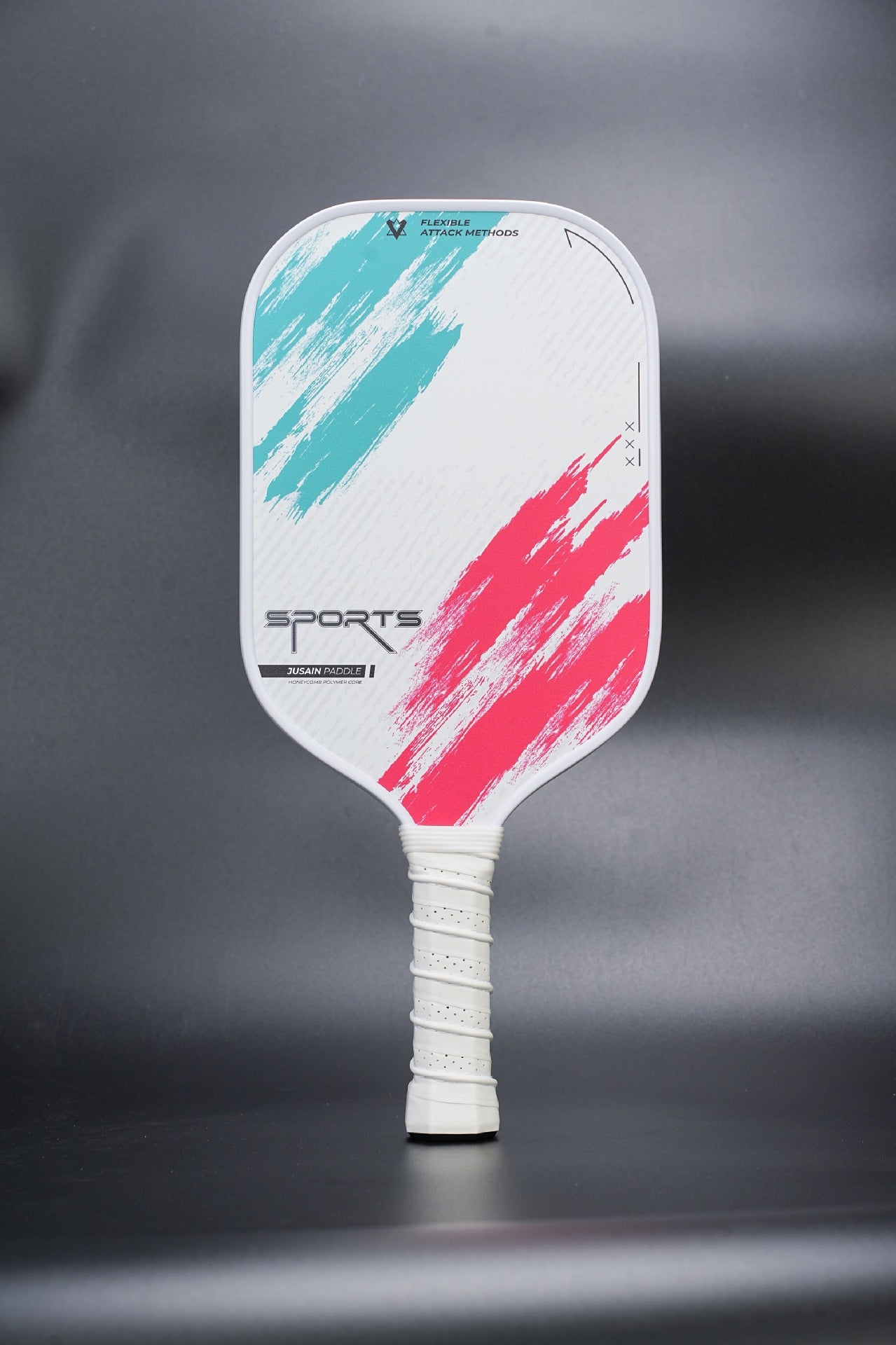 A white pickleball paddle with Xephira PADDLE text at the bottom and magenta and cyan brushstroke designs on the upper half, emphasizing FLEXIBLE ATTACK METHODS. It has a white handle. Core keywords: what is the best pickleball paddle, how do i choose a pickleball paddle for beginners, fiberglass, beginner.