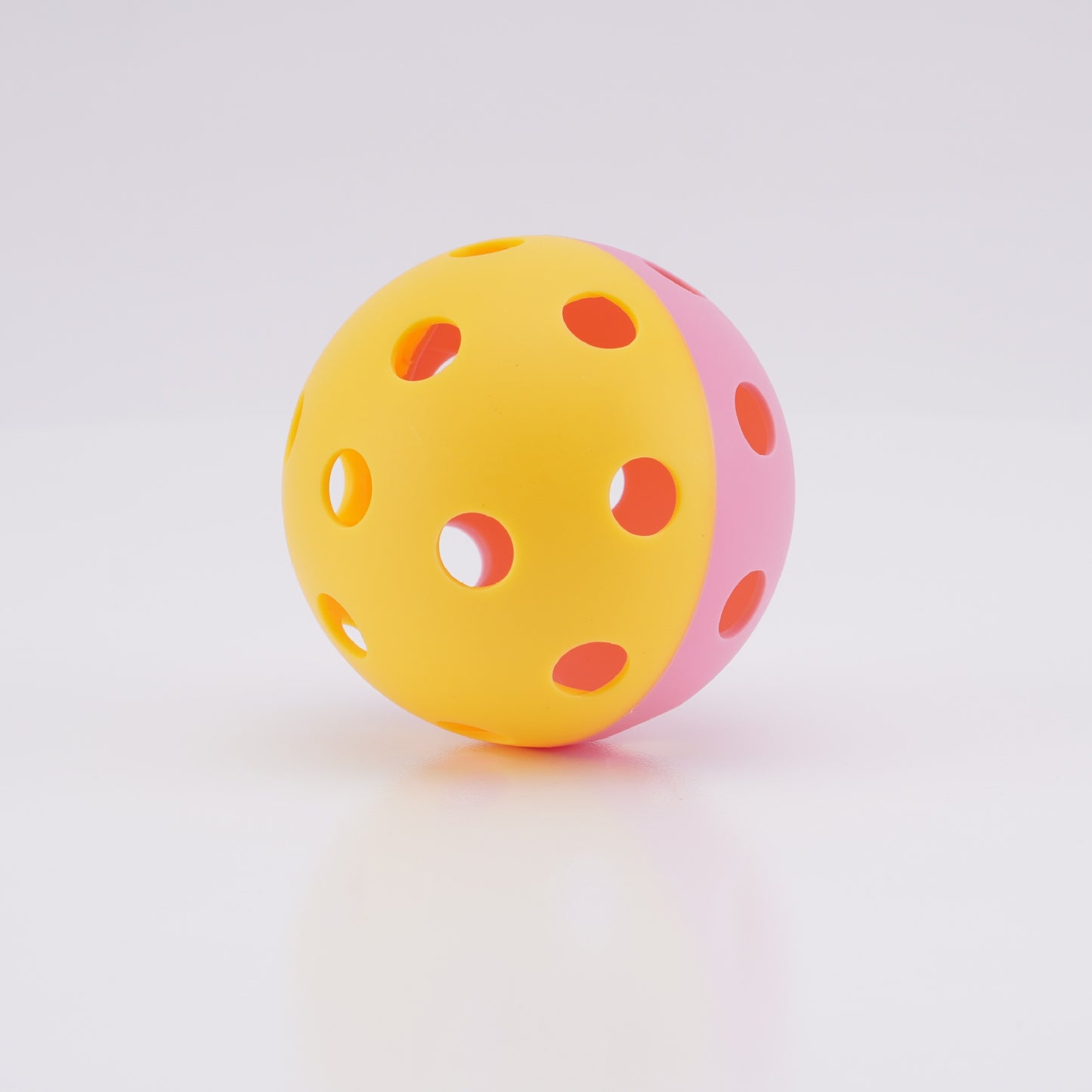 Dual-color Yellow/Pink 26-hole indoor pickleball. What is the best pickleball paddle for beginners.