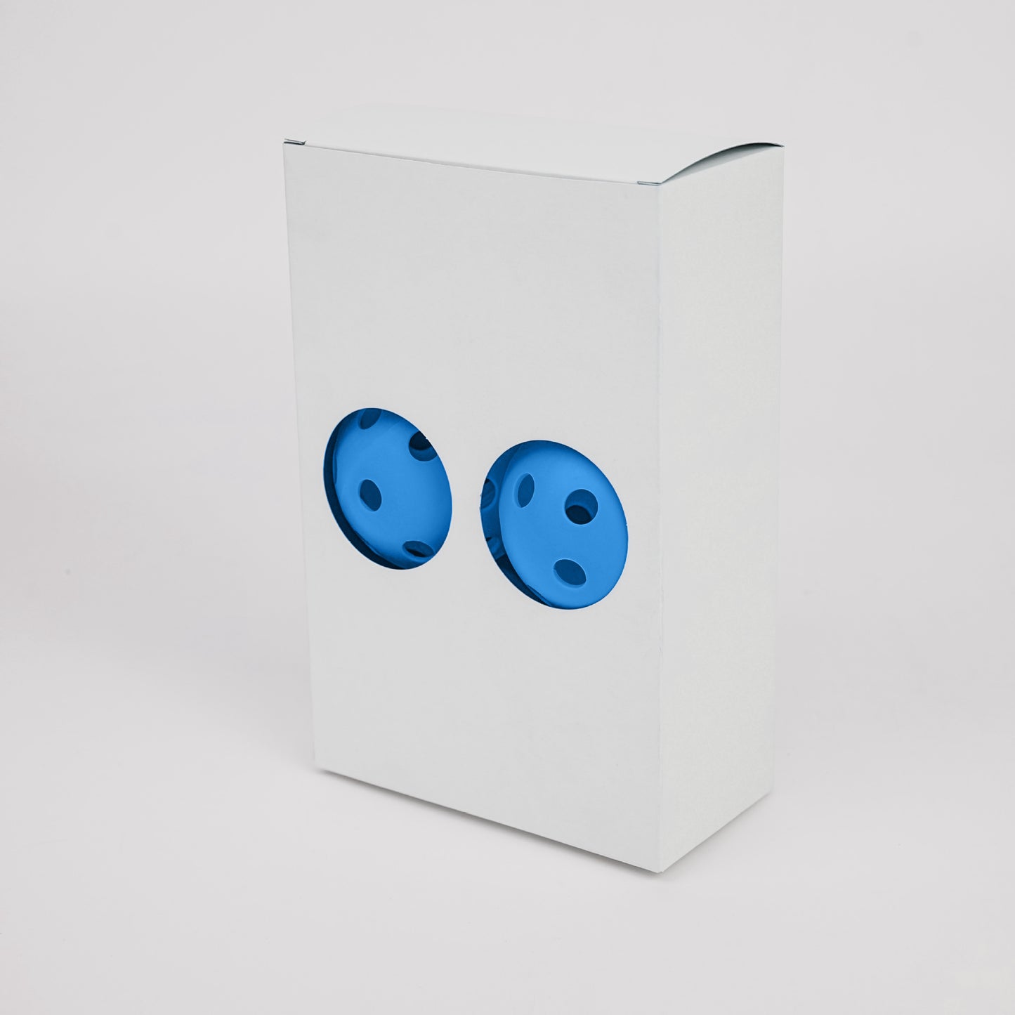 Blue TPE 26-hole indoor pickleballs in a white 6-ball box. Where to get pickleball paddles and bulk balls.